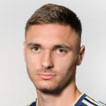 А. Колундзик