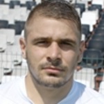 Е. Мартинов